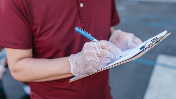 person signing form