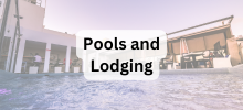 View from water level of a swimming pool looking toward buildings and lounge area, with the text "Pools and Lodging" displayed.