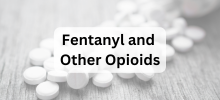 Close-up of white pills scattered on a surface, with the text "Fentanyl and Other Opioids" displayed.