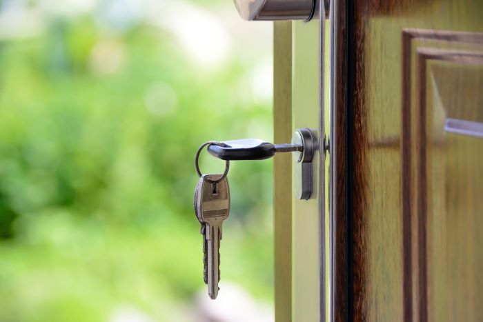 house door with key in lock