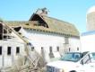 alternative programs crews work to bring down old barn to recycle wood for new market