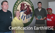 Employees holding an EarthWISE plaque. 