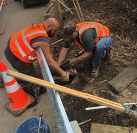 crew working on guardrail