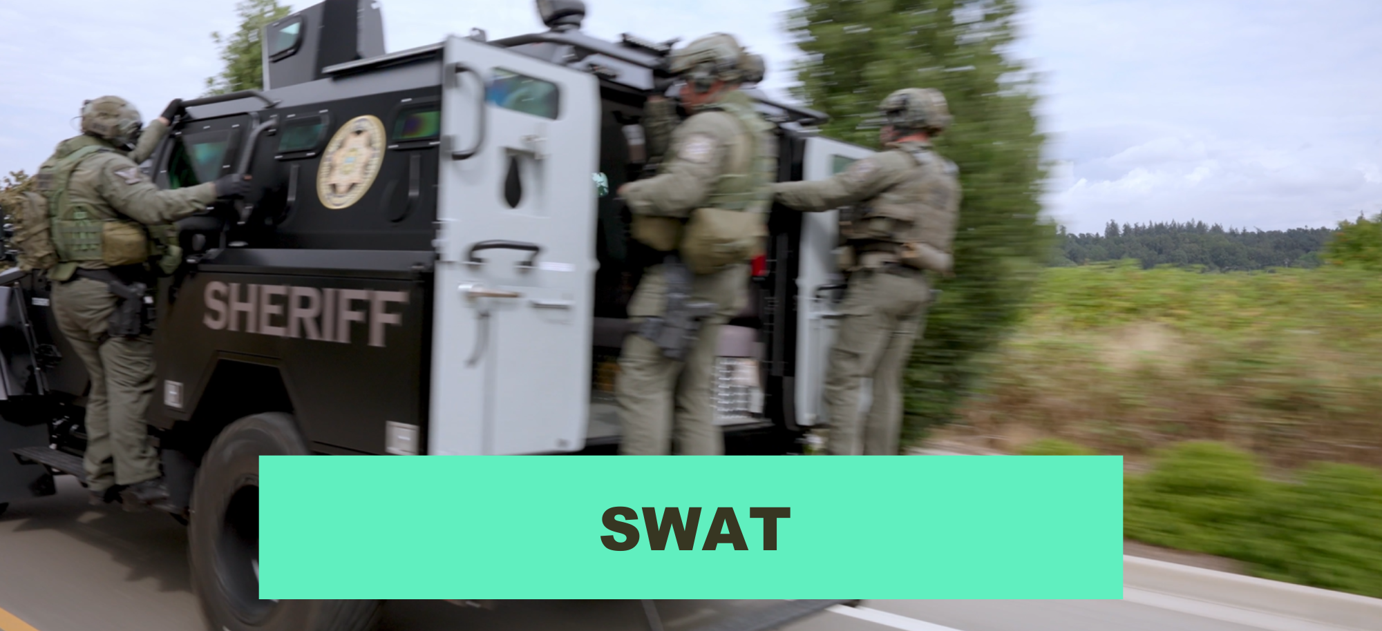 SWAT Vehicle and team driving to a scene