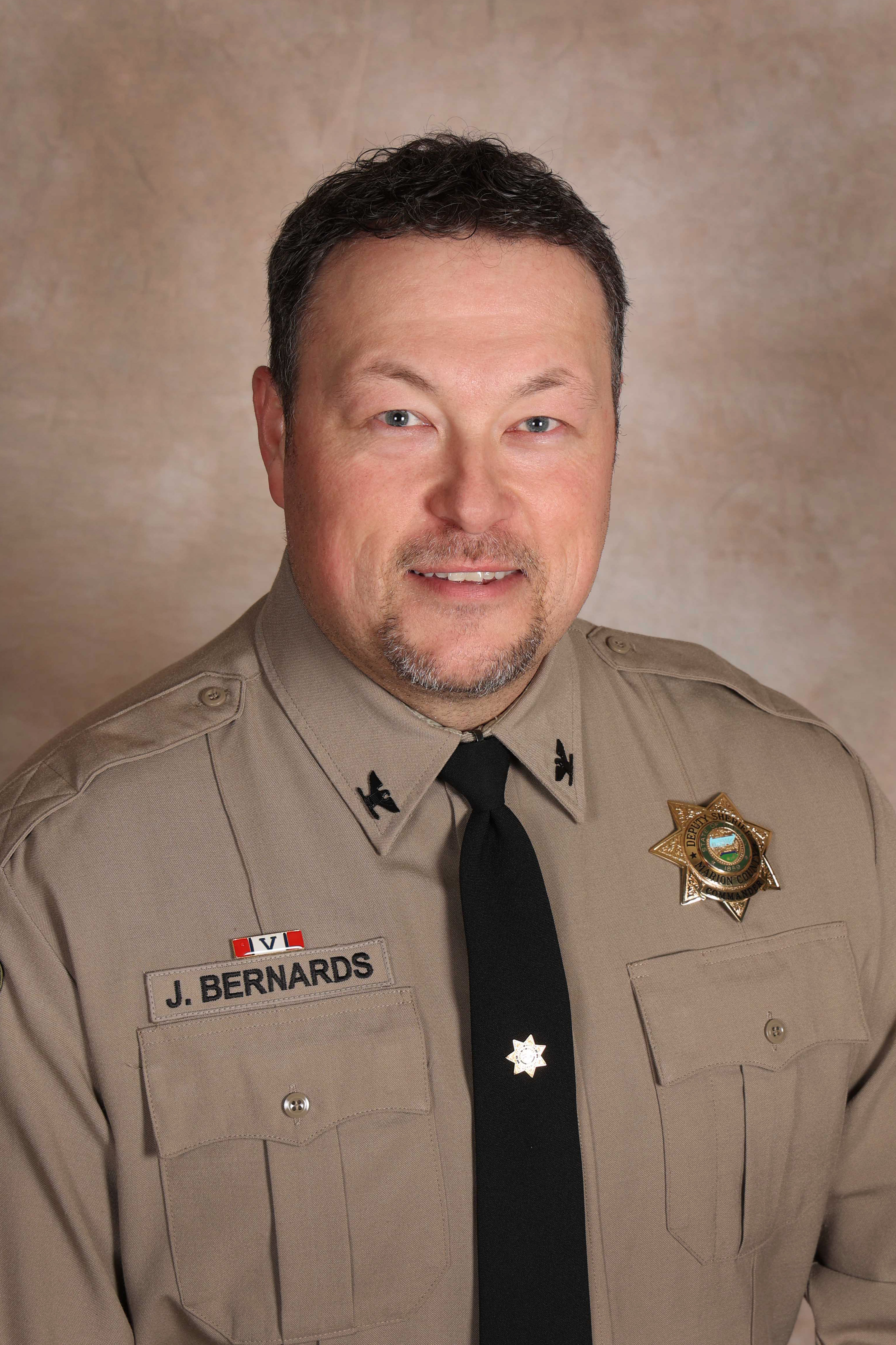 Headshot of Commander Bernards