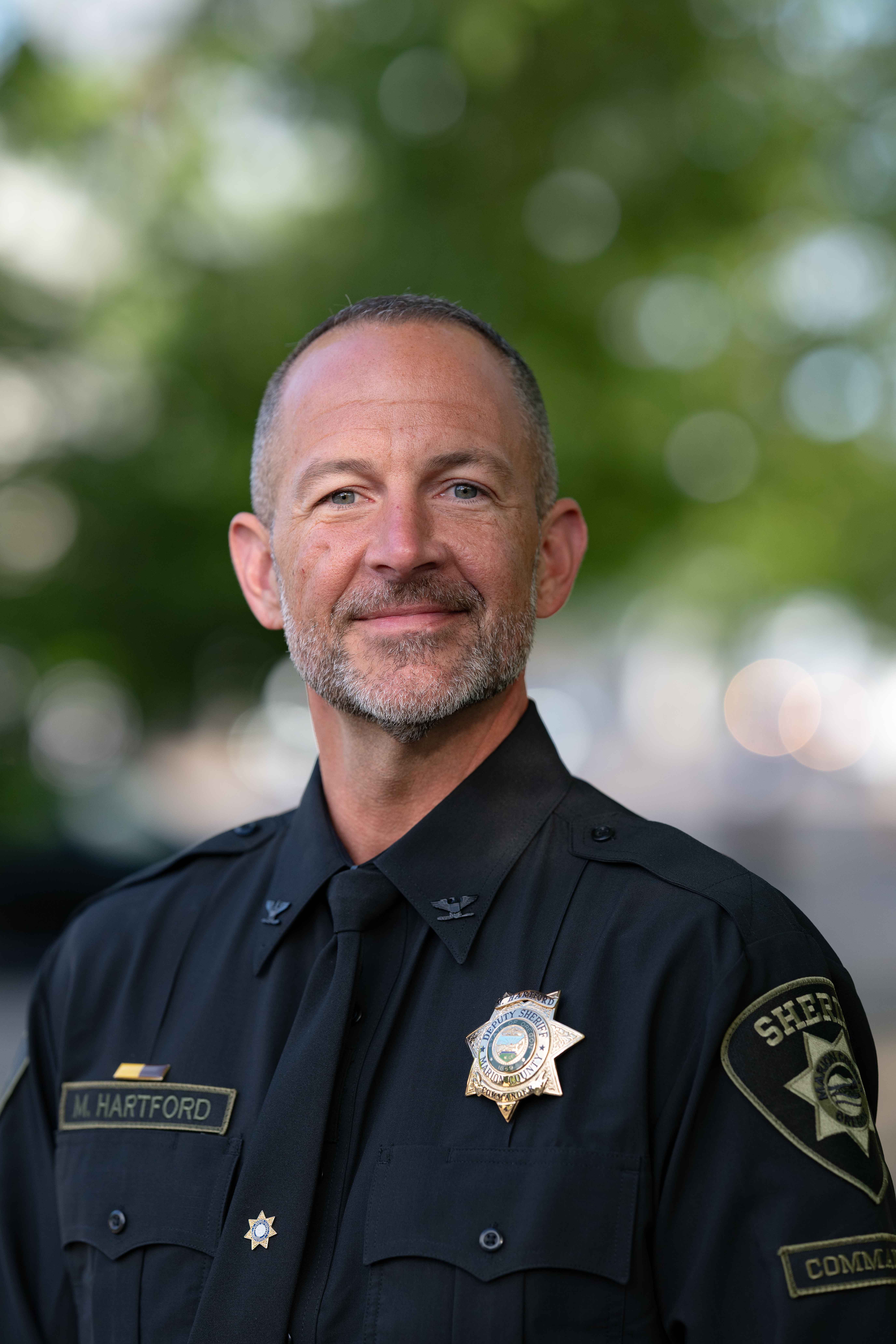 Headshot of Commander Hartford