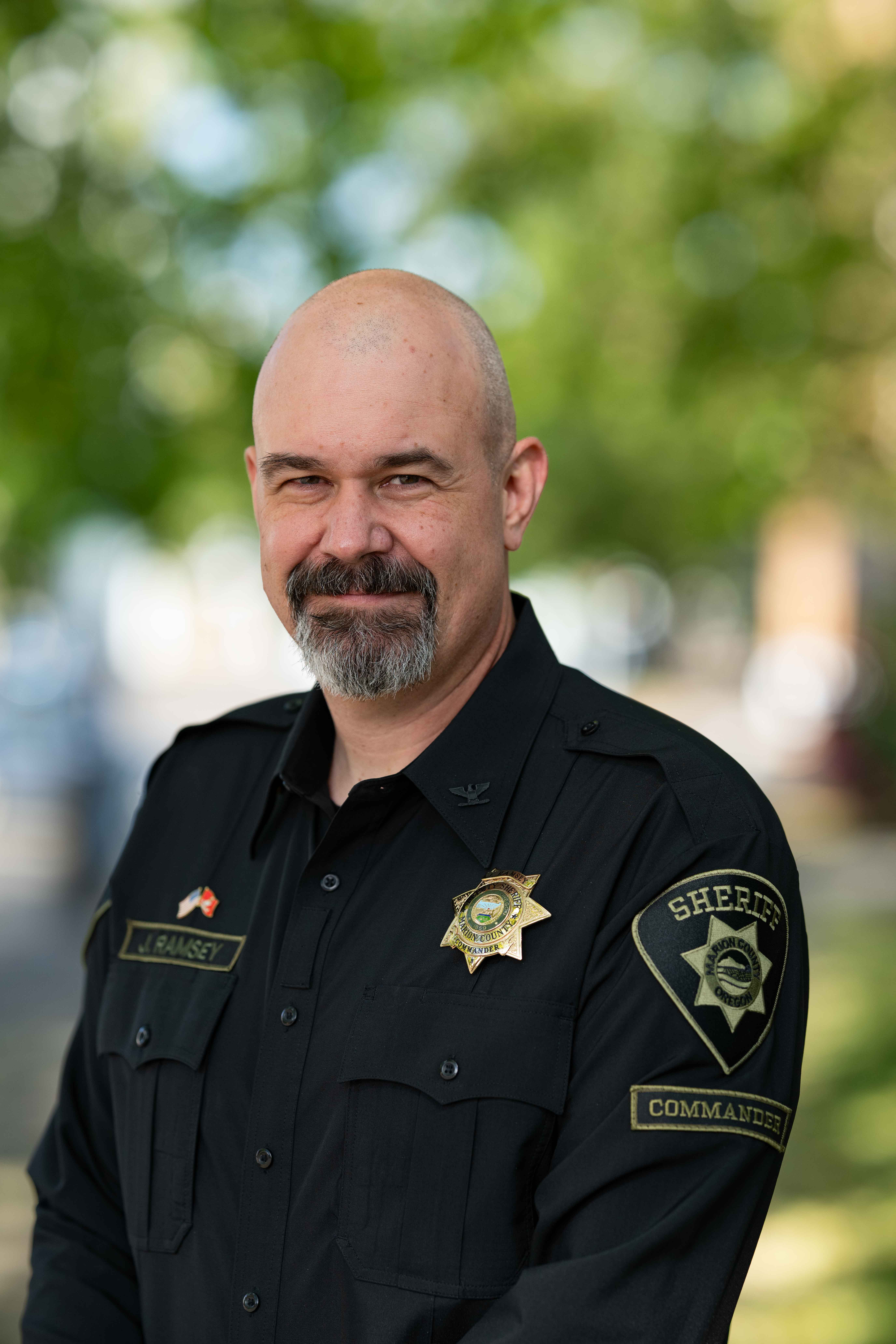 Headshot of Commander Ramsey