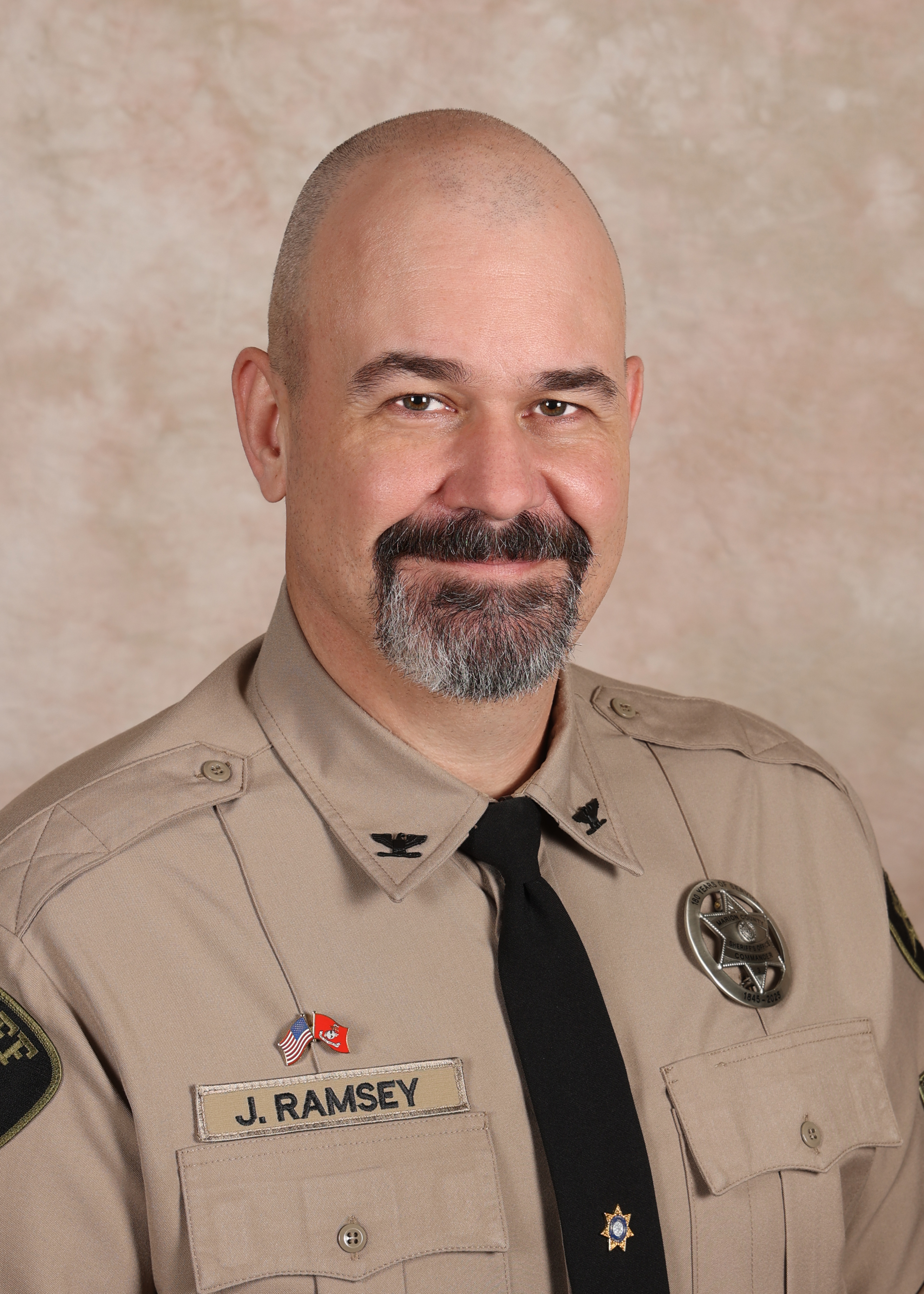 Headshot of Commander Ramsey