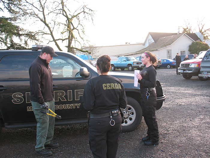 Cadets in front of Marioon County Sheriff SUV