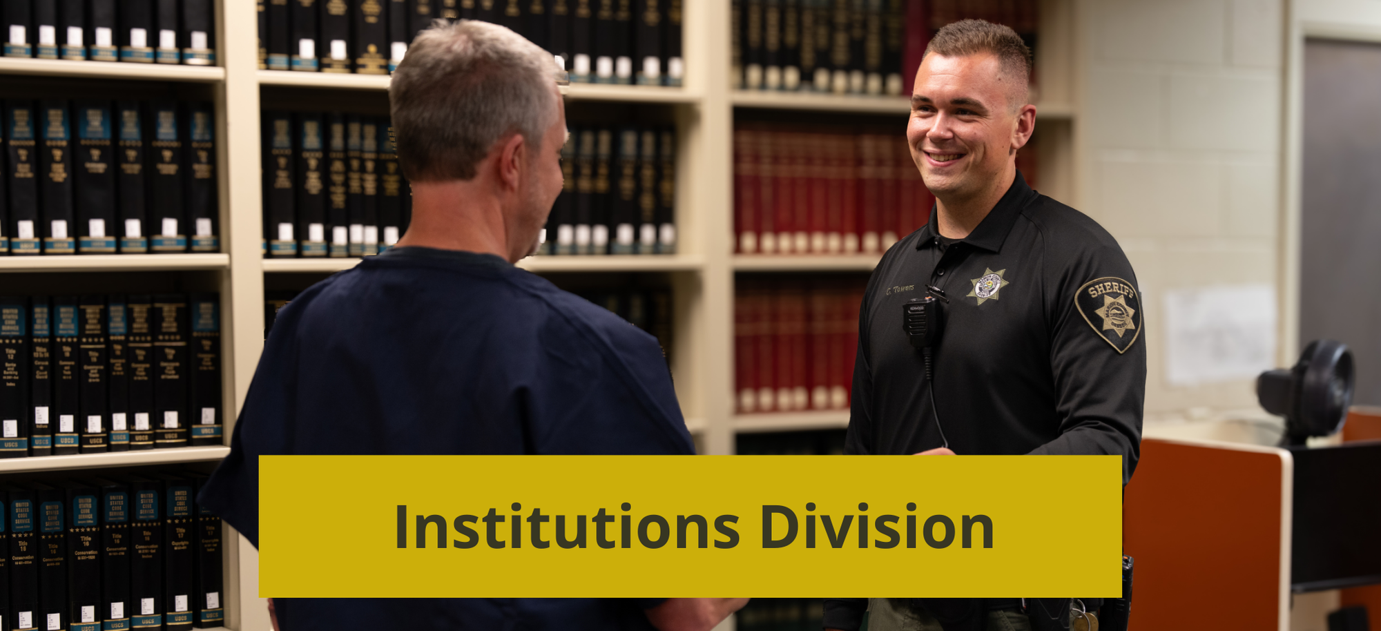 Jail Deputy Helping an AIC in the Law Library