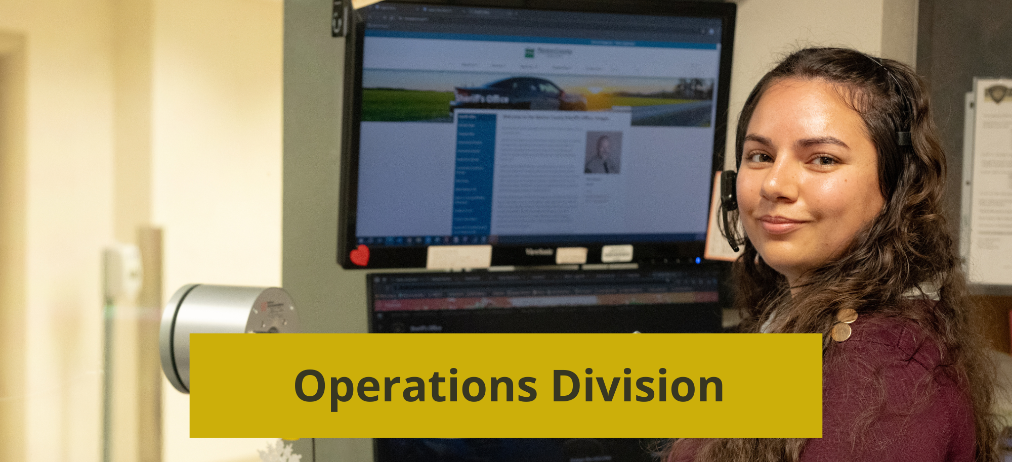 MCSO Employee working at the front desk of the operations building